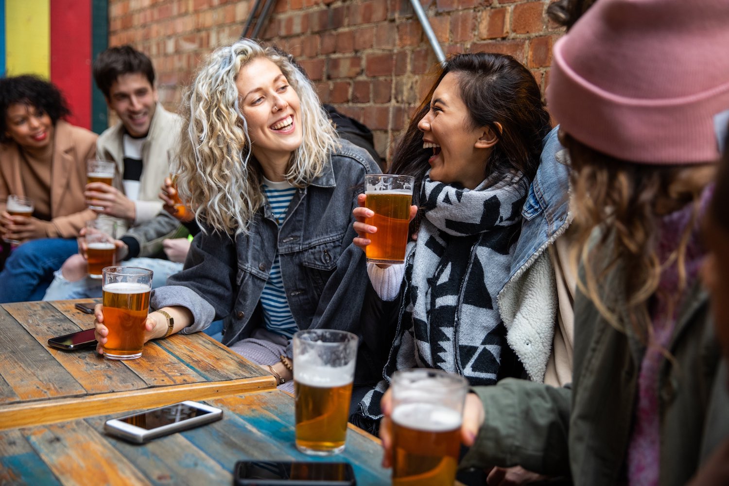 Young Adults Drinking Beer - Broken Compass Brewing